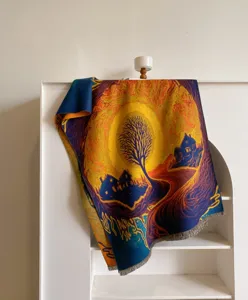 Artistic woven throw blanket with vintage landscape painting design, warm and cozy decor.