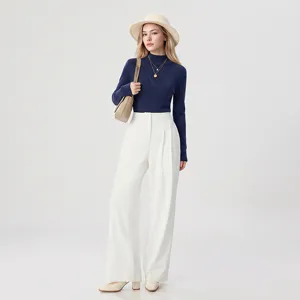 Detailed view of the women's mock neck long sleeve knit sweater in elegant navy blue style.