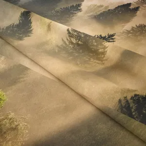 Detailed view of forest landscape tapestry wall hanging, soft fabric texture with natural drape.