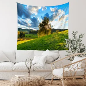 Detail view of scenic nature landscape tapestry hanging in a cozy modern living room setup.