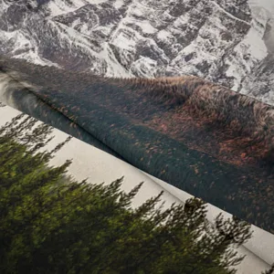 High-definition mountain forest print fabric tapestry detail, showcasing fine texture and fold.