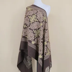 Detailed view of the brown cashmere shawl featuring intricate gold floral embroidery and fringe.