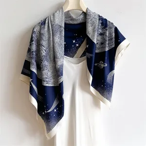 Elegant navy blue silk square scarf featuring stunning celestial star and planet print design.