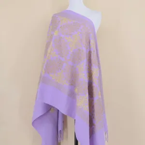Close-up of the delicate gold floral embroidery and soft lavender cashmere texture of the shawl.