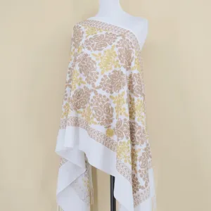 Detailed view of the white cashmere feel shawl scarf featuring elegant gold embroidery patterns.