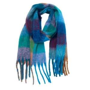 Cozy fuzzy colorful plaid scarf with soft tassel fringe, warm winter neck wrap detail.