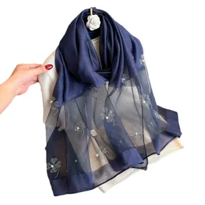 Dark blue simulation silk scarf featuring elegant beaded four-leaf clover patterns for women.