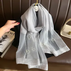 Grey sheer scarf with pearl rhinestone floral details, elegant evening shawl for women.