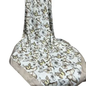Imitation silk printed twill small silk scarf for women, elegant draped butterfly design.