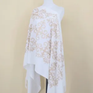 White cashmere-feel shawl with elegant beige vintage totem embroidery, warm winter accessory.