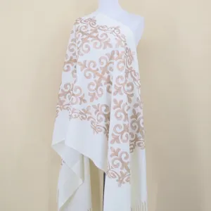 White cashmere feel scarf with exquisite embroidered totem design for autumn and winter warmth.