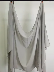 Detailed view of a solid color grey chiffon scarf, lightweight and versatile for all seasons.