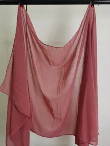 Plain chiffon scarf detail view, soft pink hanging fabric texture, lightweight shawl.