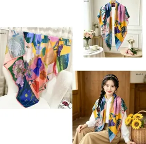 Vue détaillée du grand foulard en soie florale avec une impression botanique éclatante.