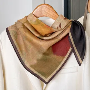 Close-up detail view of the vintage artistic retro print square scarf with soft fabric texture.