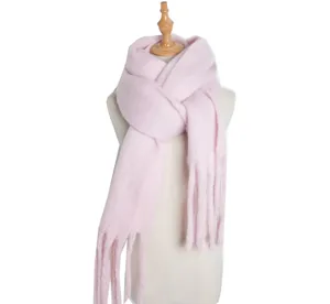 Pink loop yarn winter scarf for women, soft solid color cozy knit wrap for cold weather warmth.