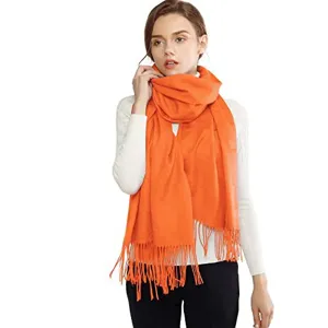 Detailed view of solid color fringe scarf shawl winter warm wrap accessory for women