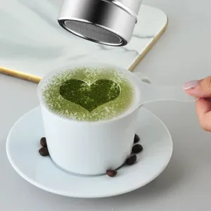 Plastic coffee stencil and shaker set for latte art, cappuccino decorating and dusting tools.