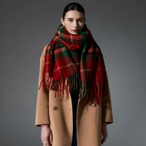 Red and green plaid fringe scarf shawl detail showcasing festive winter design for women.