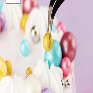 Stainless steel precision tweezers for cake decorating, fine tip baking tools for sugar pearls.
