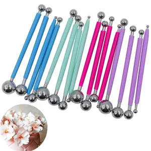 Stainless steel fondant ball tool set for cake decorating and polymer clay modeling.