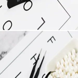Fine tip anti-static stainless steel tweezers detail shot showcasing precision grip for crafts and baking.