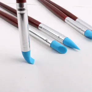 Close-up detail of flexible blue silicone tool tips designed for clay and pottery sculpting.