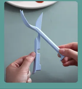Detailed close-up of portable wheat straw fork and spoon combo for outdoor dining use.