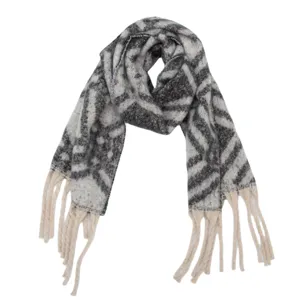 Detailed view of winter plaid boucle yarn fringe scarf tassel cozy warm fashion accessory.