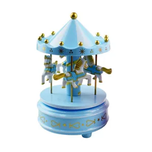 Closeup of cute blue carousel music box detail, perfect cake decor and sweet gift.