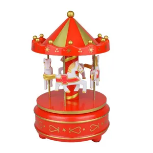 Red and gold carousel music box decoration, perfect birthday gift and cake ornament.