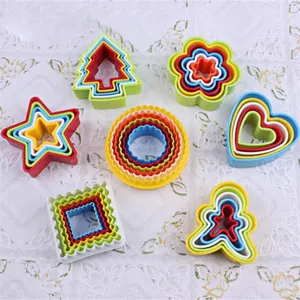 Colorful plastic cookie cutter set, various geometric shapes for baking and pastry tools.