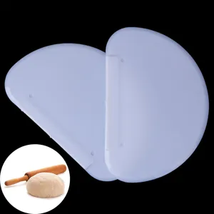 Plastic dough scraper for baking, flexible pastry cutter and cake smoothing kitchen accessory.