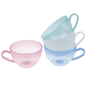 Pastel plastic mixing bowls set with handles for baking, colorful kitchen food prep containers.