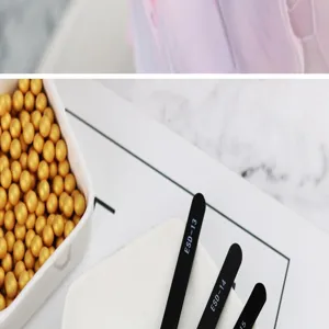 Precision anti-static stainless steel tweezers for cake decorating and sugar pearls.