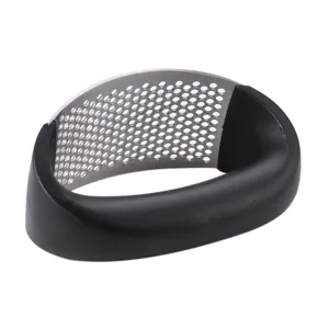 Stainless steel manual garlic press rocker with ergonomic black handle for kitchen cooking