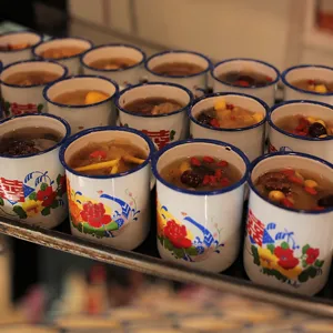 Retro enamel mug vintage style drinking cup with classic traditional floral patterns for home.