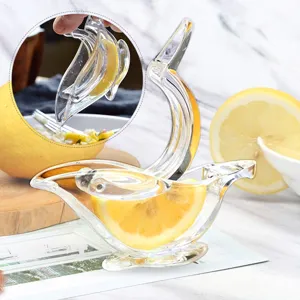 Clear acrylic bird lemon squeezer manual fruit juicer detail view for fresh kitchen use.