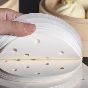 Carta antiaderente forata per vaporiera, ideale per ravioli, panini e cottura a vapore.