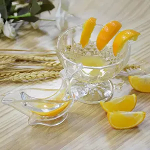 Clear acrylic manual lemon juicer bird shaped mini fruit squeezer tool for kitchen use.
