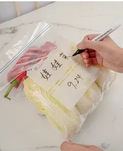 Transparent food storage ziplock bag detail with writable label for kitchen freezing use.