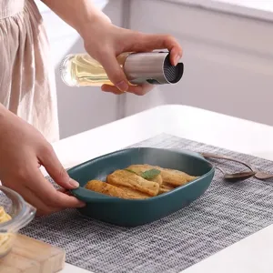 Glass oil spray bottle for kitchen cooking, barbecue, and baking. Press type mister dispenser.