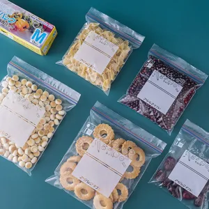Transparent food storage ziplock bags with double seal and write-on label for kitchen organization.