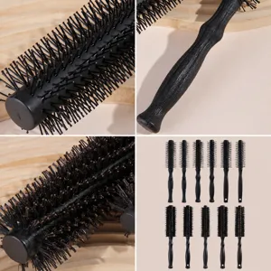 Professional boar bristle round hair curling brush with imitation wood handle for styling.