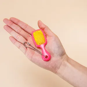 Mini spazzola per capelli vuota portachiavi pettine da tasca da viaggio ciondolo borsa rosa stile