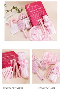 Pink hair comb gift set detailing view featuring styling brush, hair clips, and curling ribbon.