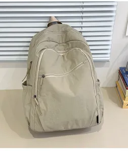Zaino casual beige impermeabile con tasche multiple, vista dettagliata per viaggio e scuola