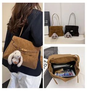 Retro large capacity suede briefcase women's shoulder crossbody bag with cute bunny charm.