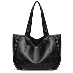 Black PU leather tote bag for women, large capacity stylish shoulder handbag for daily work.
