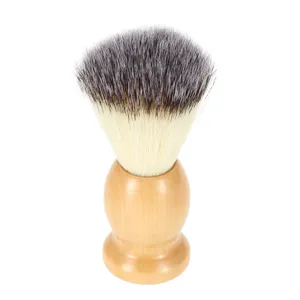 Wood handle shaving brush detail showing soft synthetic bristles and natural grain.
